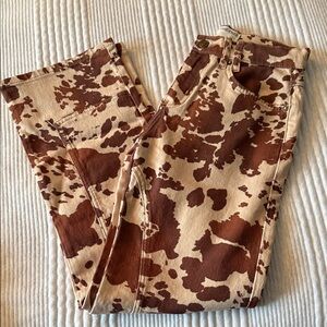 Free people cow print pants worn once! Size 25